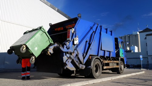 Commercial waste collection truck in Reigate