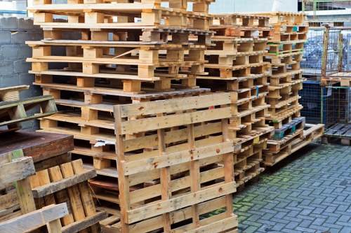 Team practicing safe lifting and PPE usage during collection